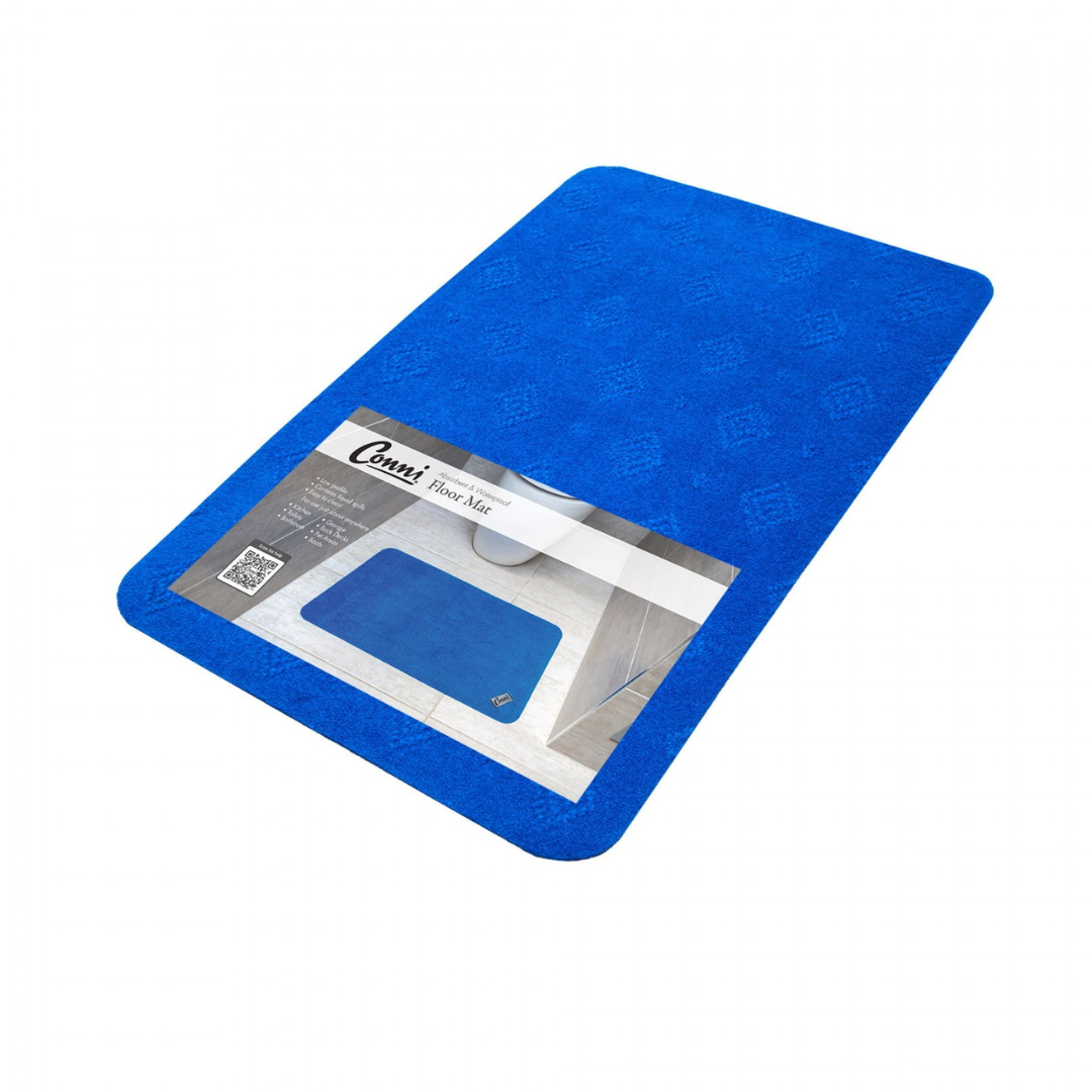 Conni Compact Floor Mat with absorbent fabric top and waterproof, non-slip backing, designed for incontinence and spill protection in residential and aged care environments.