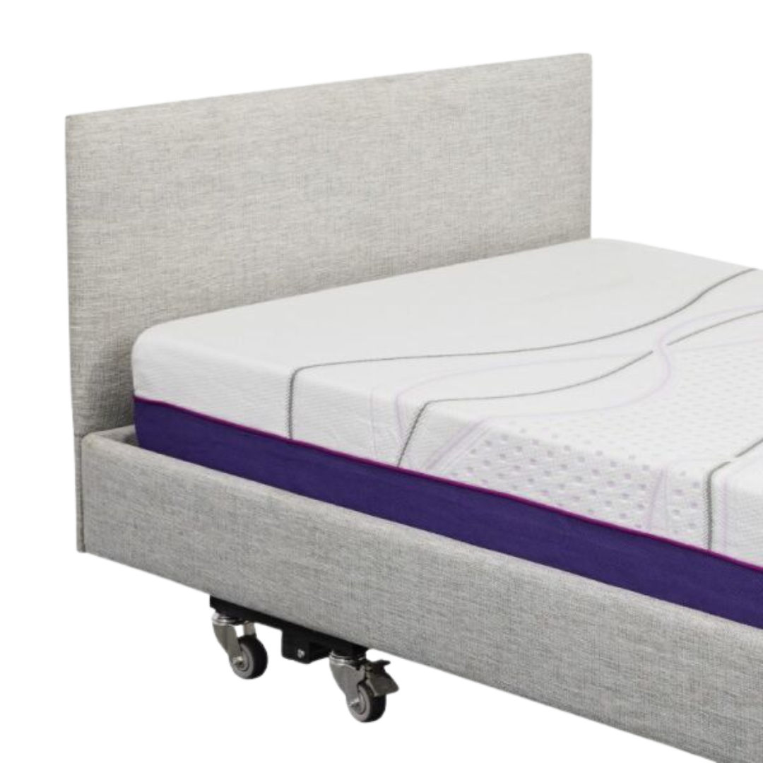 Icare Headboard mounted on an adjustable bed, featuring soft upholstery and pillow retention support for enhanced comfort and bedroom style.