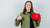 woman holding an emergency kit for home