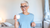 senior-woman-holding-glass-milk-home-middle-age-woman-drinking-glass-fresh-milk-with-happy-face-standing-smiling-with-confident-smile-showing-teeth