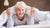 elderly woman happy from using Pressure Care Products to prevent bed sores