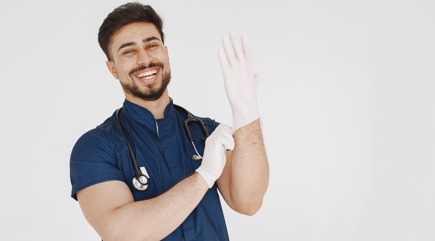 doctor wearing nitrile gloves smiling