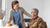 nurse taking care of an elderly with nutritional foods