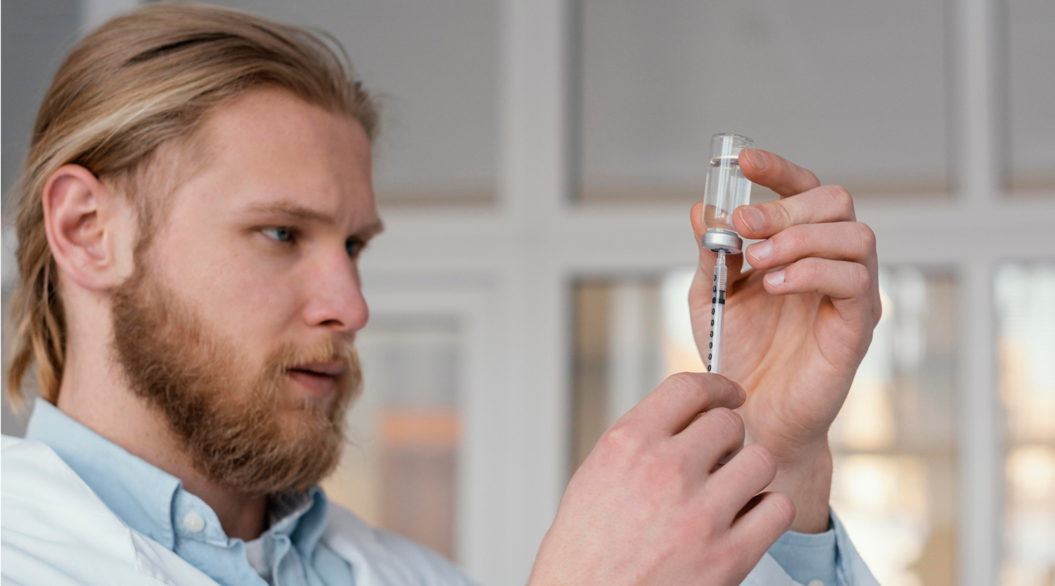 close up doctor preparing injection peptides