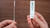person-holding-rapid-testing-kit-close-up