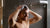 person drying their hair after using gentle shampoo treatment