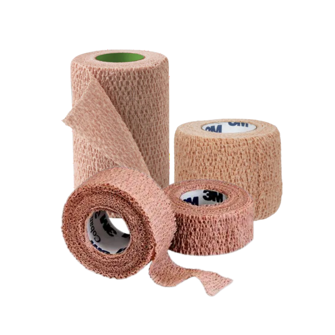 A group of four different sized and colored rolls of 3M Coban self-adherent cohesive bandages, showing the texture and 3M logo on the interior of the rolls.