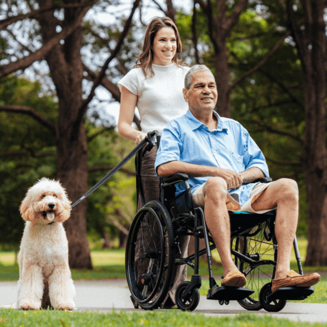 Aspire VIDA X Folding Wheelchair with adjustable armrests, swing-away leg rests, and large self-propelling rear wheels in a charcoal aluminium frame.