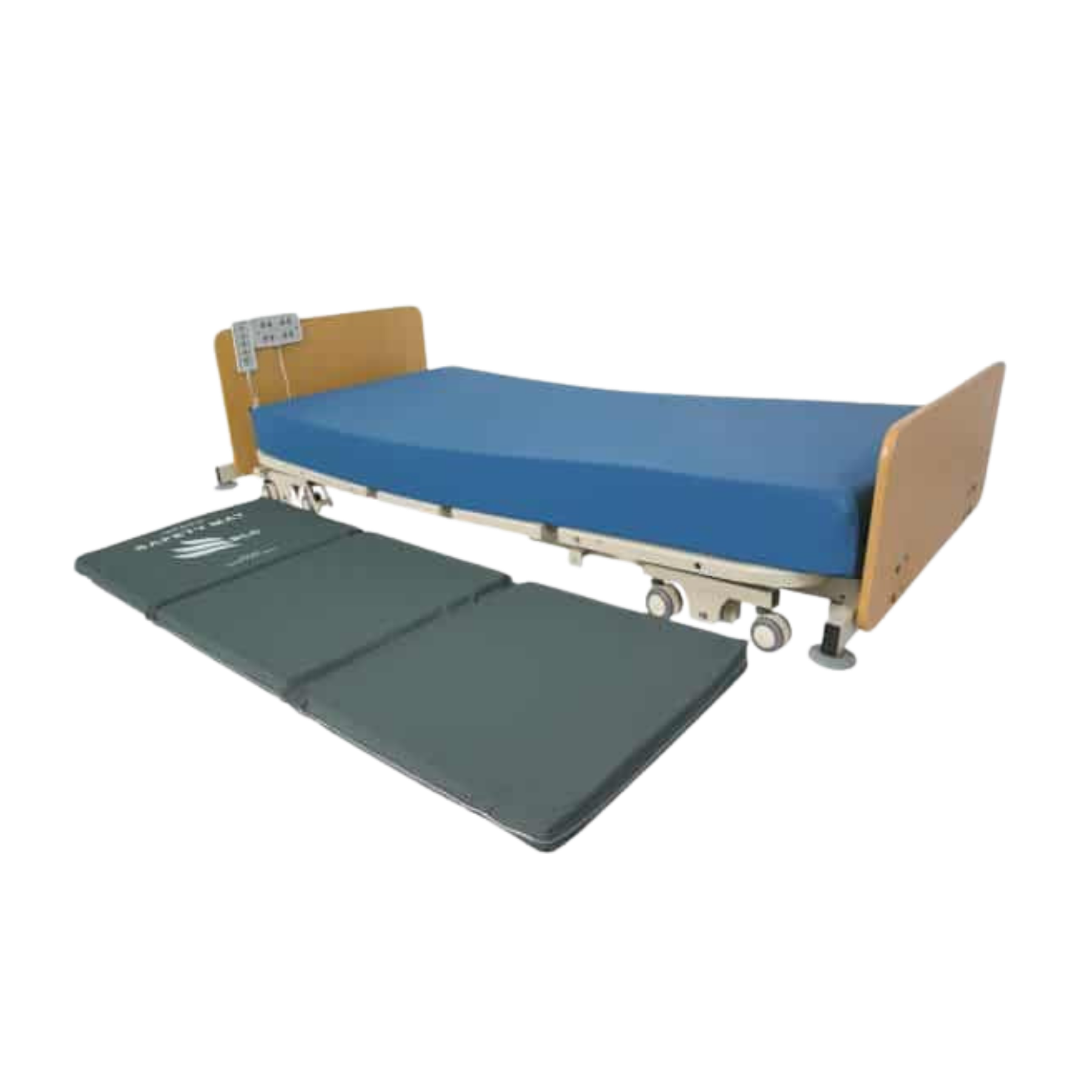Dark gray tri-fold safety crash mat by Cobalt Health shown fully laid out alongside an adjustable medical bed for bed fall prevention.