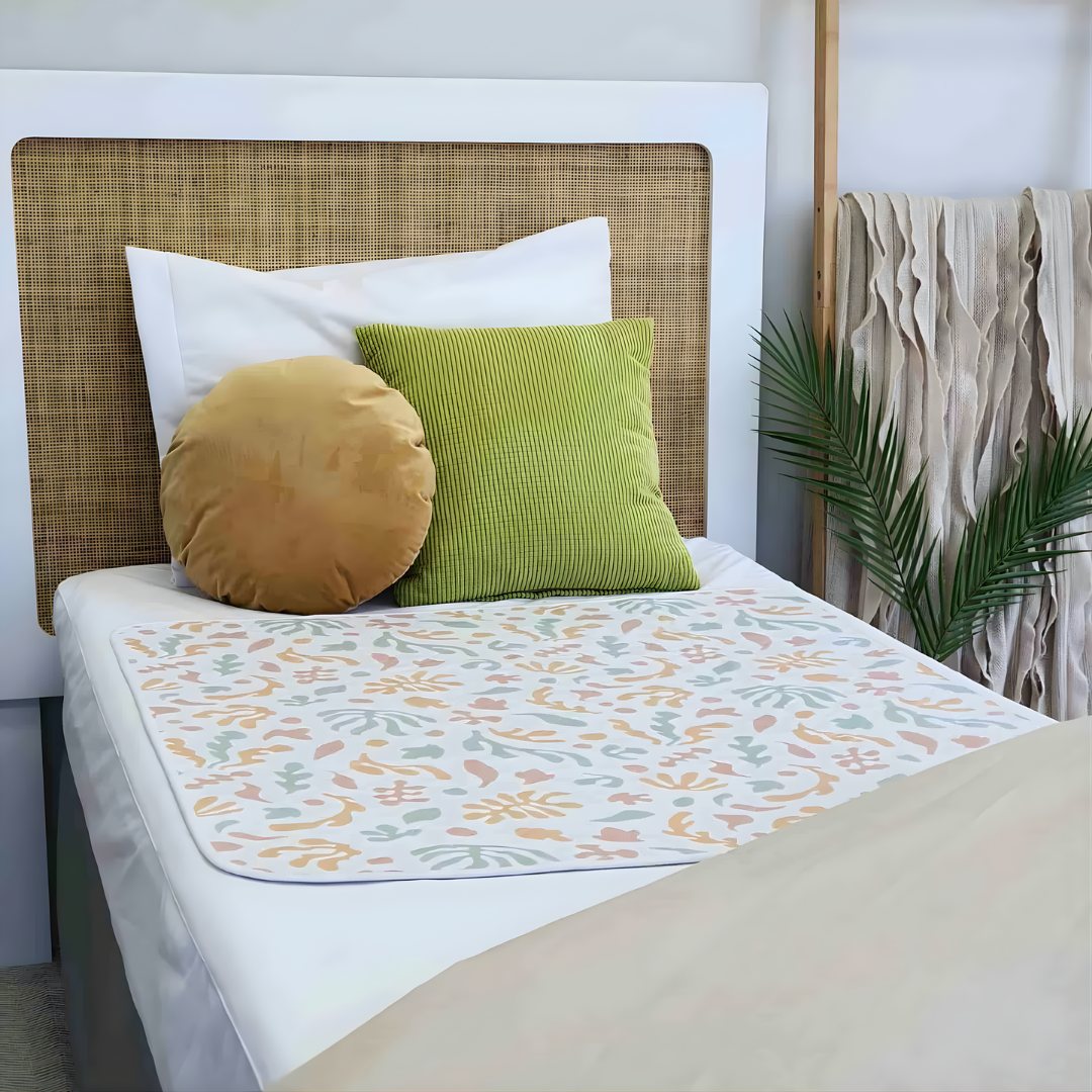 Conni Bed Pad Organic Print Standard variant, reusable washable continence aid providing bedding protection with soft absorbent fabric and stylish design.