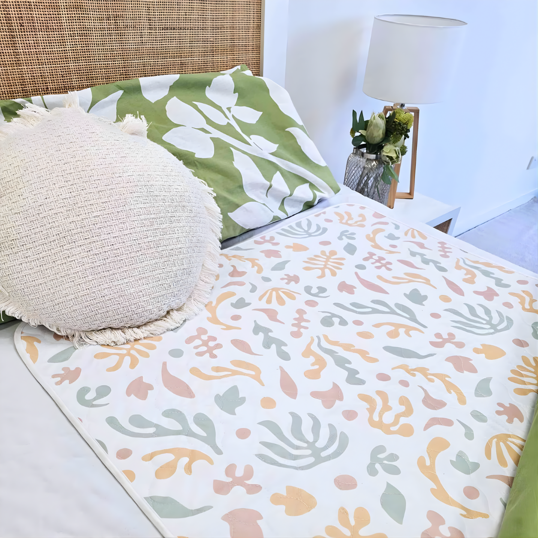 Conni Bed Pad Organic Print Standard variant, reusable washable continence aid providing bedding protection with soft absorbent fabric and stylish design.