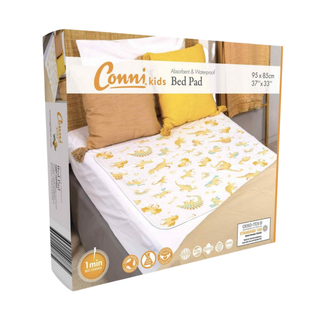 Conni Kids Bed Pad Unicorn & Dinosaur, available in standard and tuck-in variants, reusable waterproof protection for children’s nighttime comfort.