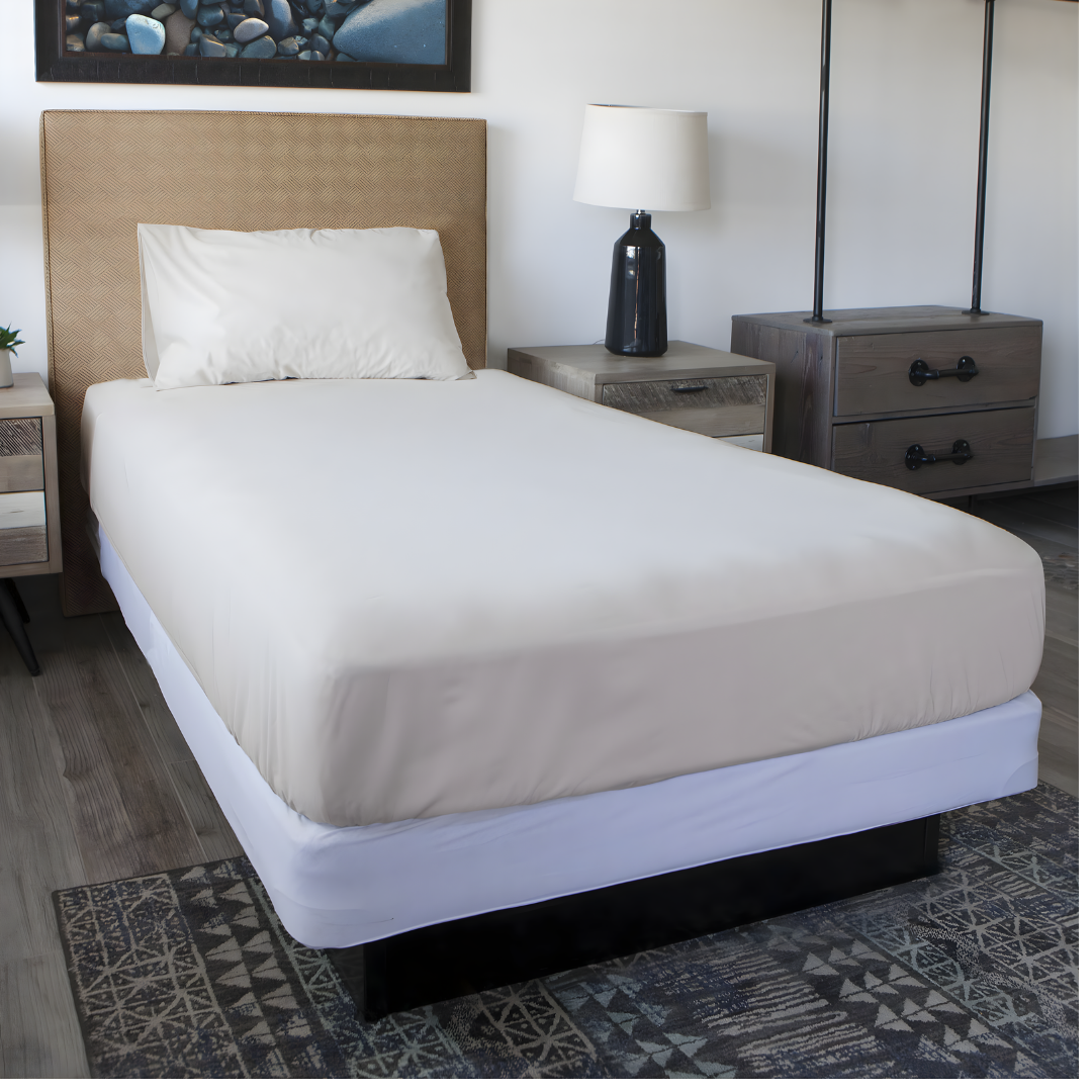 Conni Mattress Protector in multiple sizes provides discreet, washable waterproof bedding protection for comfort, dignity, and continence care.