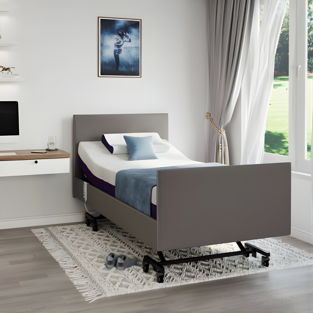 Icare IC333 Homecare Bed shown with adjustable backrest and leg rest, featuring upholstered finish and ultra-low height for safe mobility.