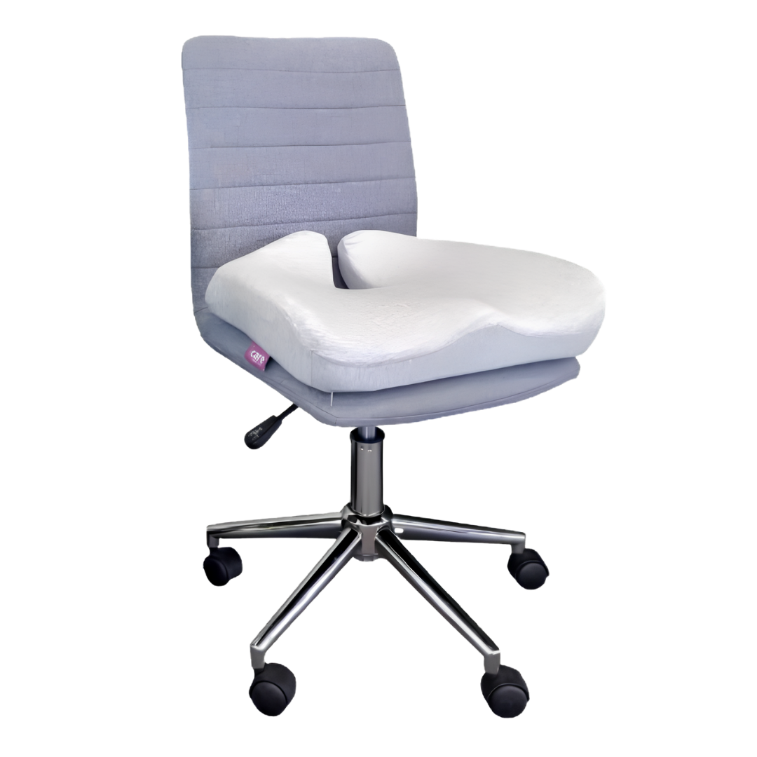 Icare Reform Seat Support cushion with charcoal‑infused ActiveX foam, ergonomic moulded zones, coccyx cutout, and anti‑slip base for pressure relief and comfort.