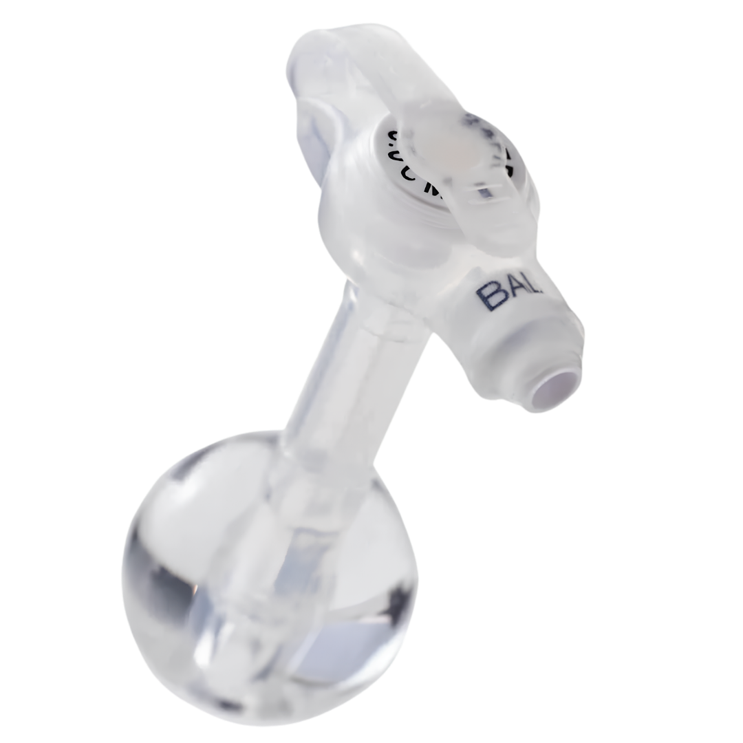 Mic-Key G 24 French low-profile balloon gastrostomy feeding tube with ENFit extension set, medical device designed for enteral feeding, featuring a flat button-style port and detachable extension tubing.