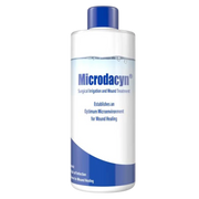 Microdacyn Wound Care Solution 990mL spike bottle for sterile, non-toxic wound irrigation and antimicrobial cleansing in clinical and surgical care settings.
