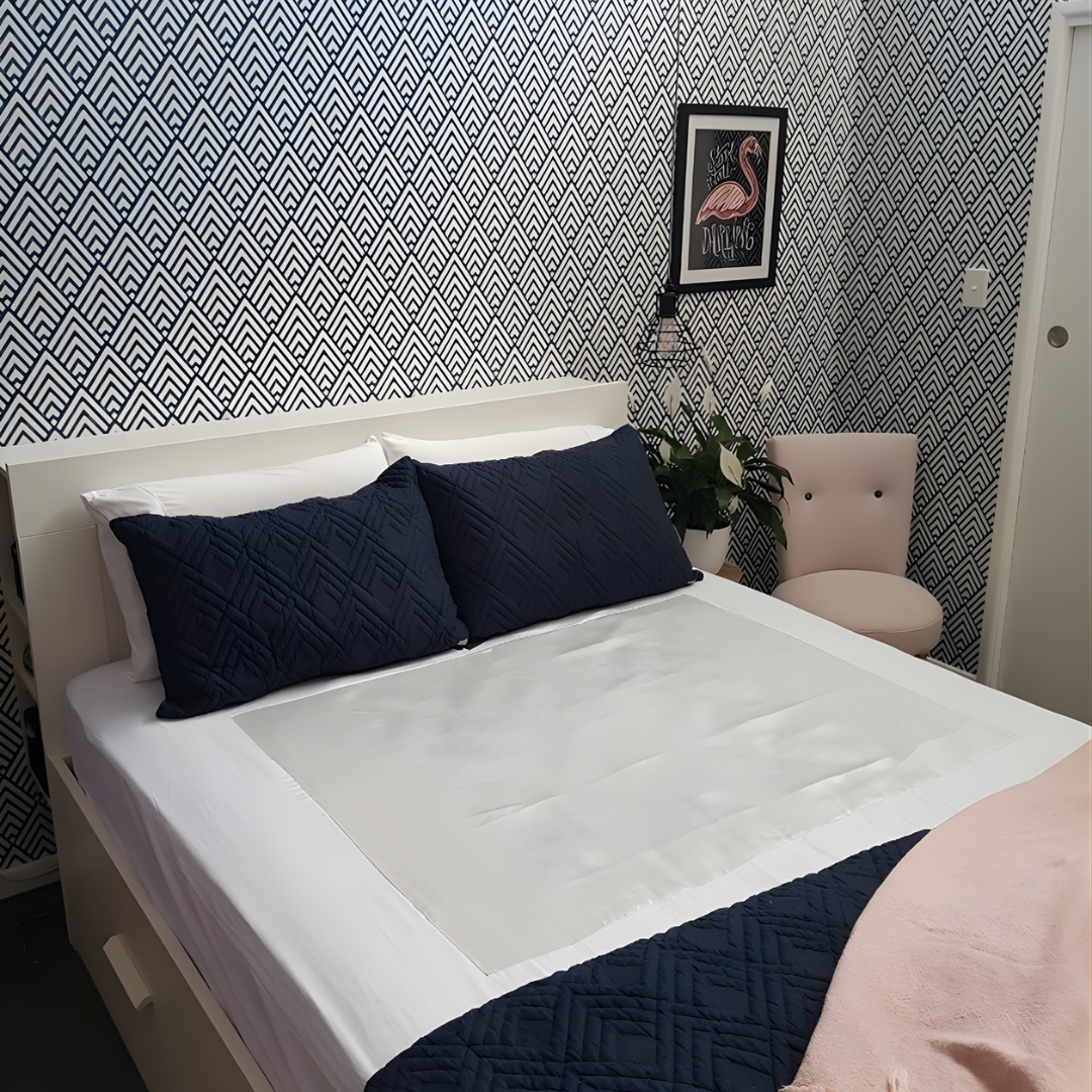 Neeki Designs Wonder Sheet Plus Fitted Sheet with satin centre panel for mobility and comfort.