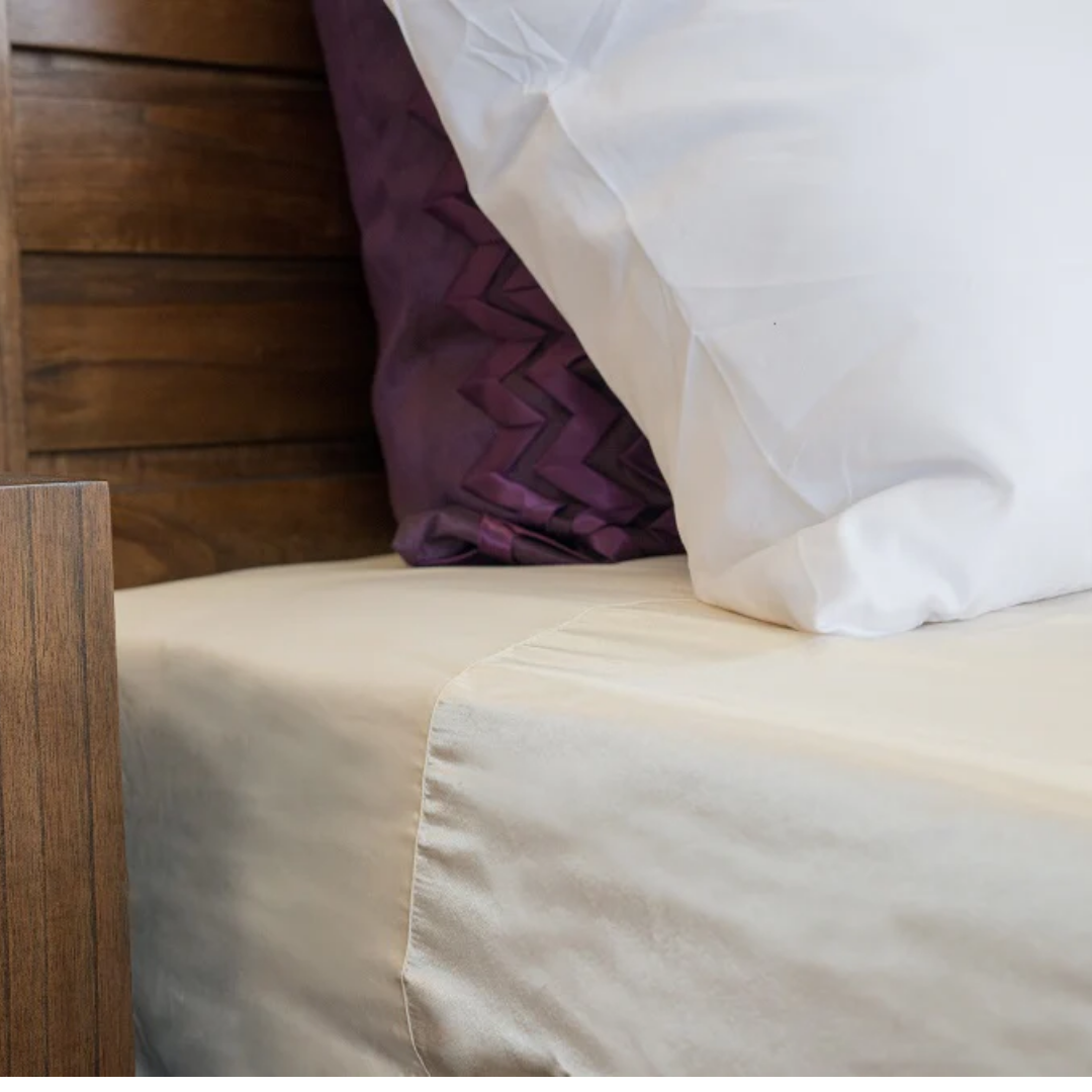 Neeki Designs Wonder Sheet Plus Fitted Sheet with satin centre panel for mobility and comfort.
