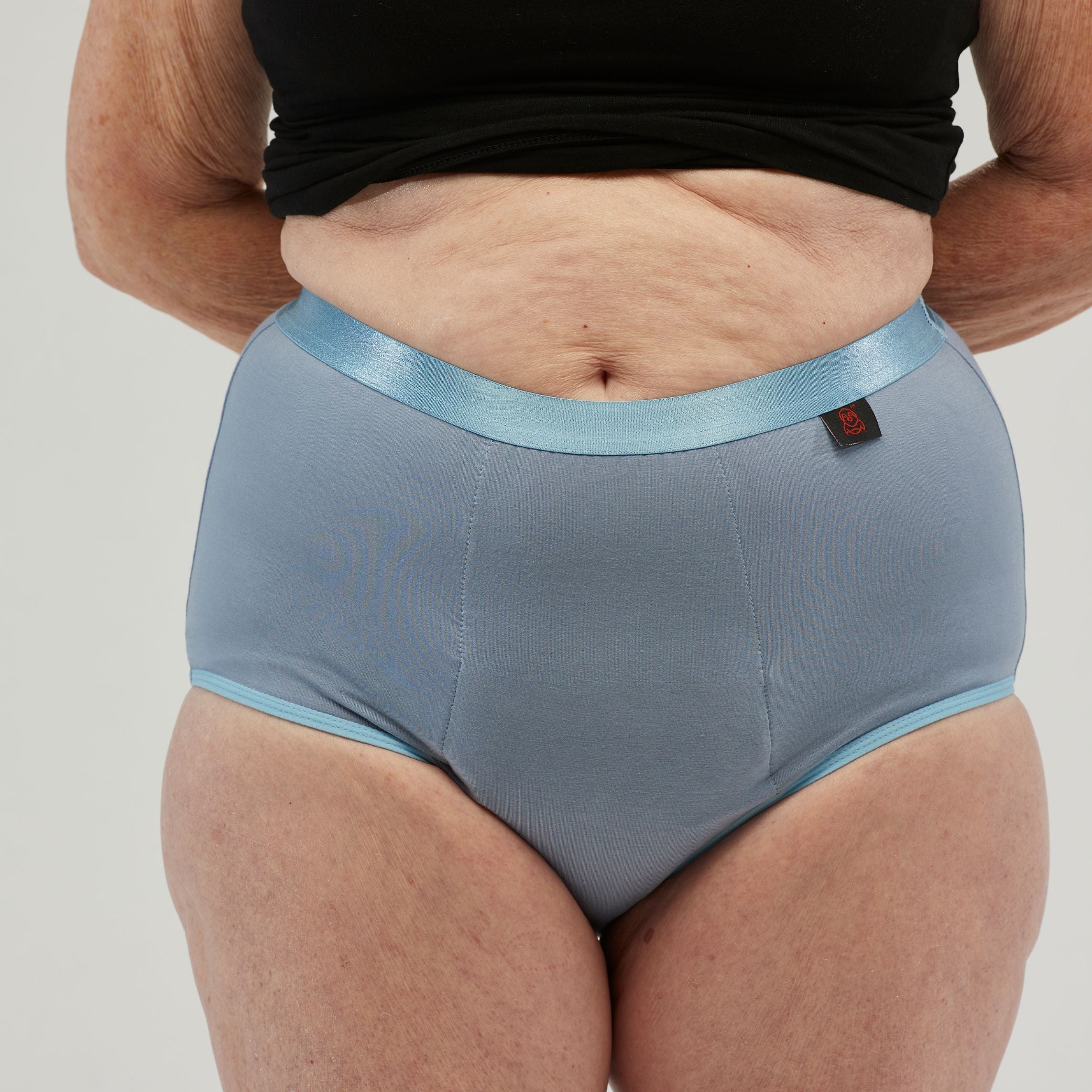 Close-up of StayDry women's full brief underwear in blue, featuring a waterproof, incontinence-friendly design with a soft, comfortable fit for all-day protection and confidence.