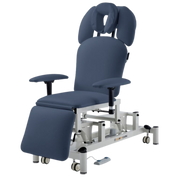 Front perspective of the navy blue spa massage table showing the padded leg section and the clean, modern white frame design suitable for beauty clinics.