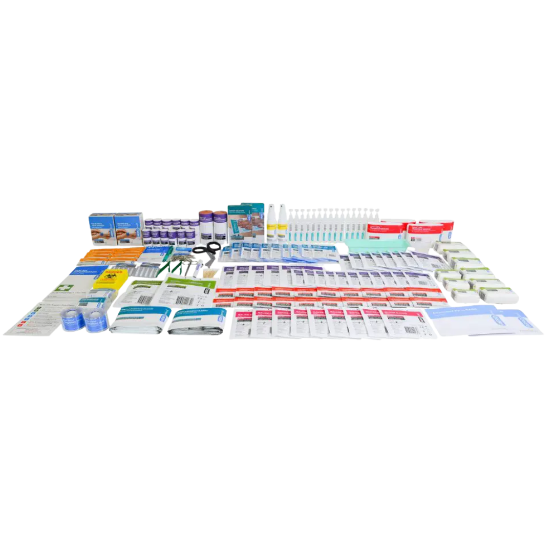 Detailed overhead view of all individual medical and non-medical supplies spread out on a white background, representing the full contents and potential refills for the Commander series.