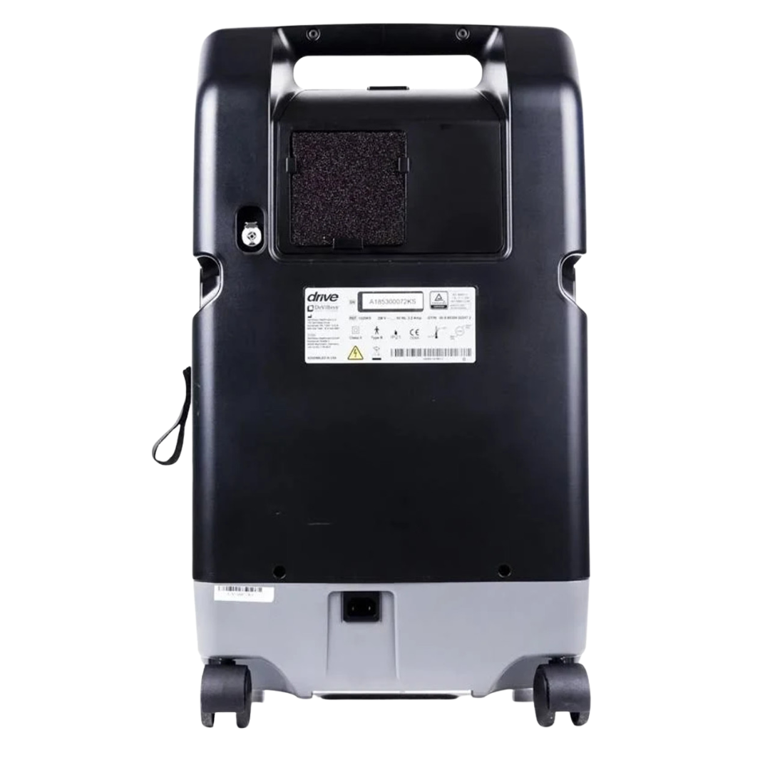 Rear view of Drive DeVilbiss Oxygen Concentrator showing filter compartment, power cord slot, and product label.
