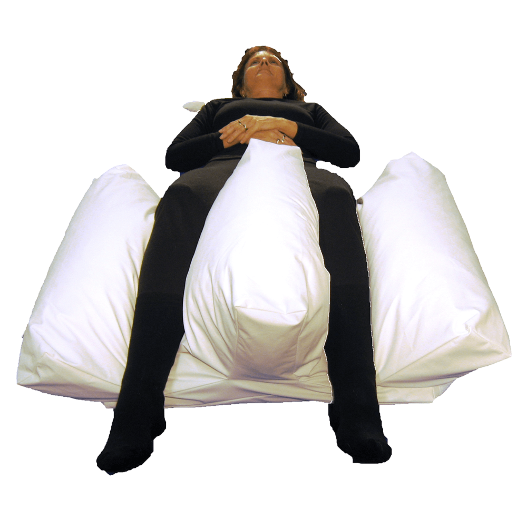 Side view of the Medifab Body Wedge Snooze Large in use, showing the top leg wrap secured over the user's lower legs for stable positioning.