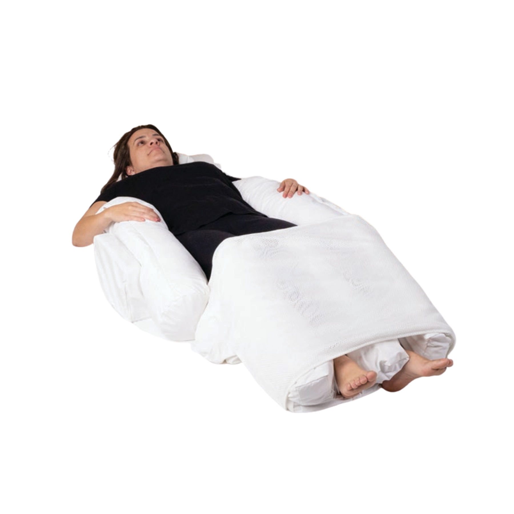 Front-facing view of a person lying in the Medifab Body Wedge Snooze, demonstrating how the central trough and side bolsters support the legs in a neutral position.