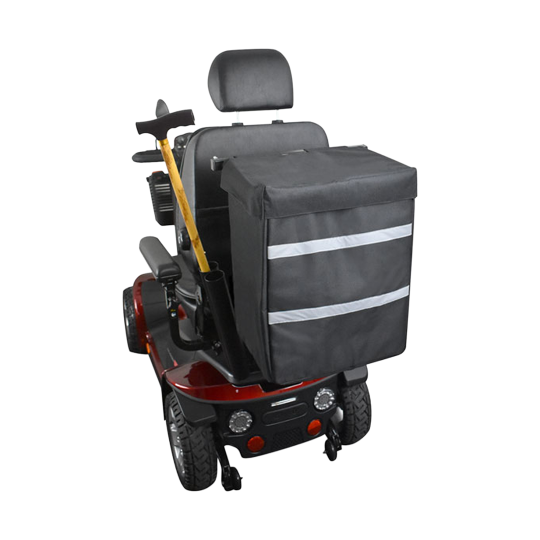 Back view of a mobility scooter with a large storage bag attached on a white background