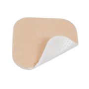 Close-up of OsmoCel® Si Silicone Hydroporous Foam dressing without adhesive border. The dressing features a soft beige silicone layer with one corner peeled back, revealing the white foam structure for optimal wound protection and comfort.
