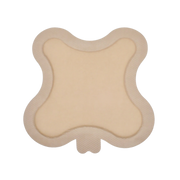 OsmoCel® Si Silicone Hydroporous Foam dressing in Sacral Butterfly shape, bordered design for secure adhesion. Features a soft beige silicone layer with contoured edges for sacral wound care, providing gentle adhesion and effective exudate management.
